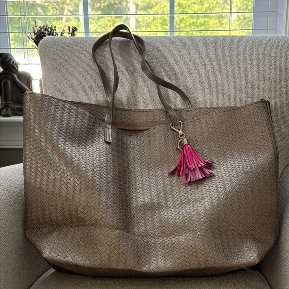 Elegant Brown Tote Bag with Pink Tassel